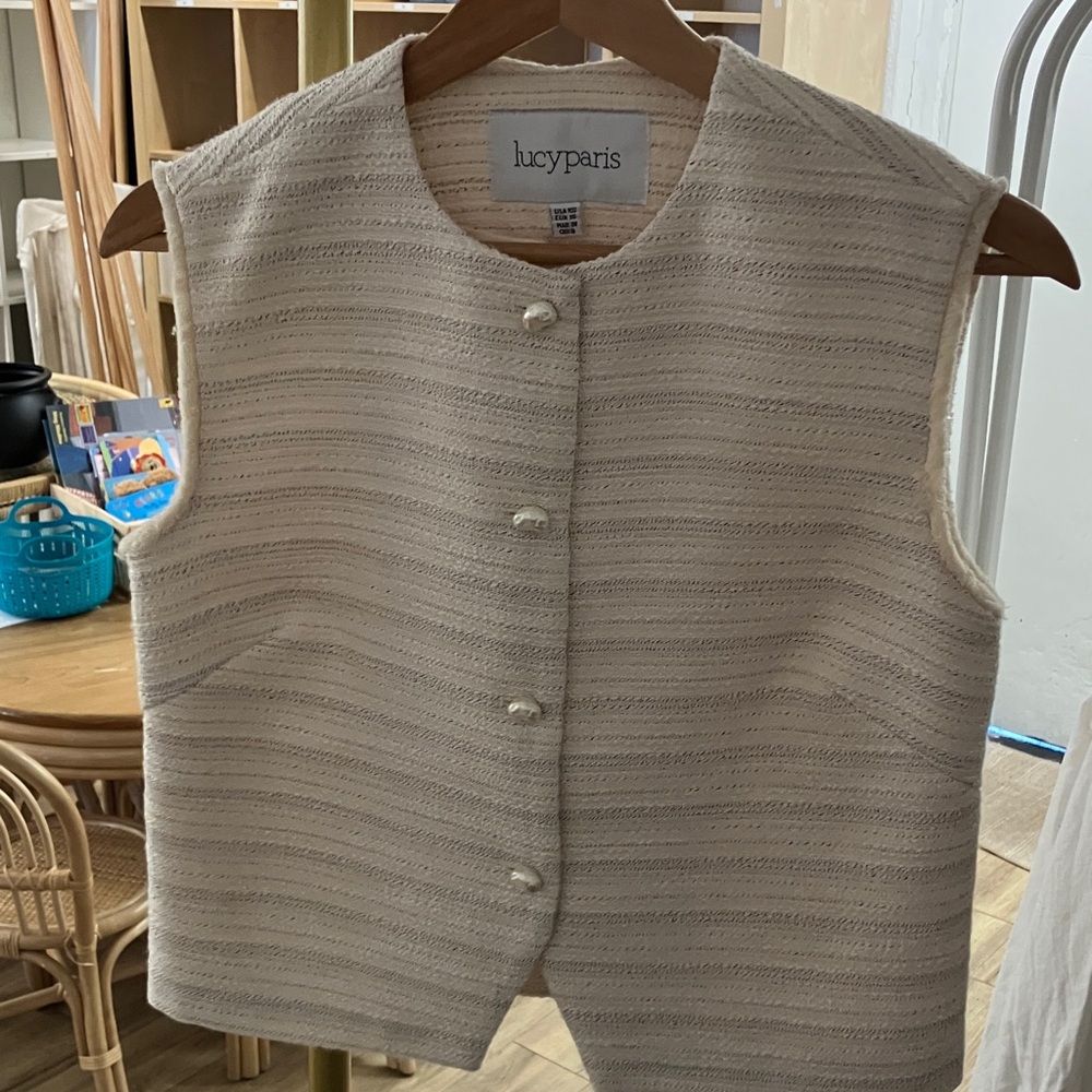 Raeann vest
Lucy Paris Cream Textured Button Front Sleeveless Vest